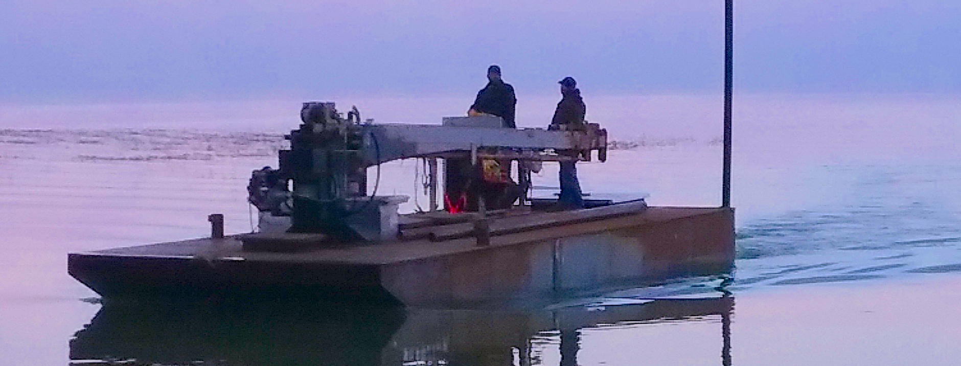 Steel Barge with Crane on Lake Huron, Designed and Fabricated by Arc Rite Welding near Bay City, Michigan.